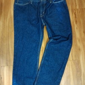 Dark Denim Men's Jeans with gold threading and aged bronze buttons and zipper.